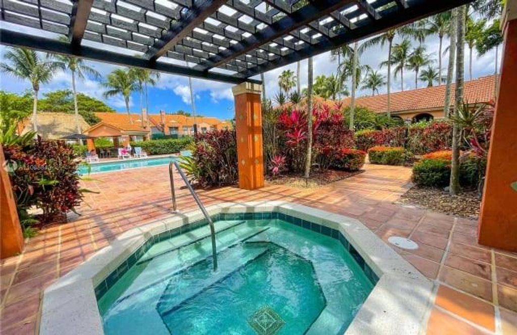 Photo of 3133 Clint Moore Rd #101, Boca Raton, FL 33496 (MLS # F10317118)