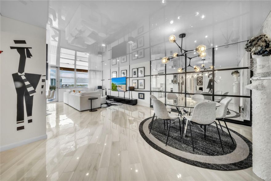 Newly renovated and designer-decorated apartment featuring brand-new finishes and high-end appliances. Comes fully furnished with high-quality, tasteful furniture perfect for hosting or relaxing. Also comes with large, south-facing balcony with spectacular Intracoastal views. Kitchen is finished with tile surfaces and top-of-the-line appliances: Liebherr refrigerator, Bosch dishwasher, Whirlpool cooktop, oven, and microwave. Bosch washer and dryer located inside apartment bathroom. A stretch ceiling with white gloss in the living room makes apartment feel spacious and dazzingly lit with natural light. Convenient location with many grocery stores and restaurants in the immediate area, and only a 5 minute walk from the beach. Call or text listing agent, apartment can be shown same day.