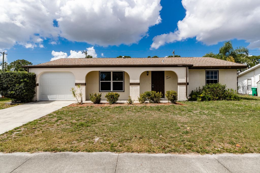 Photo of 200 NW Airoso Boulevard, Port Saint Lucie, FL 34983 (MLS # R10783092)