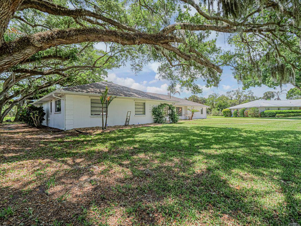 Photo of 3360 Buckinghammock Trail, Vero Beach, FL 32960 (MLS # B26017753)