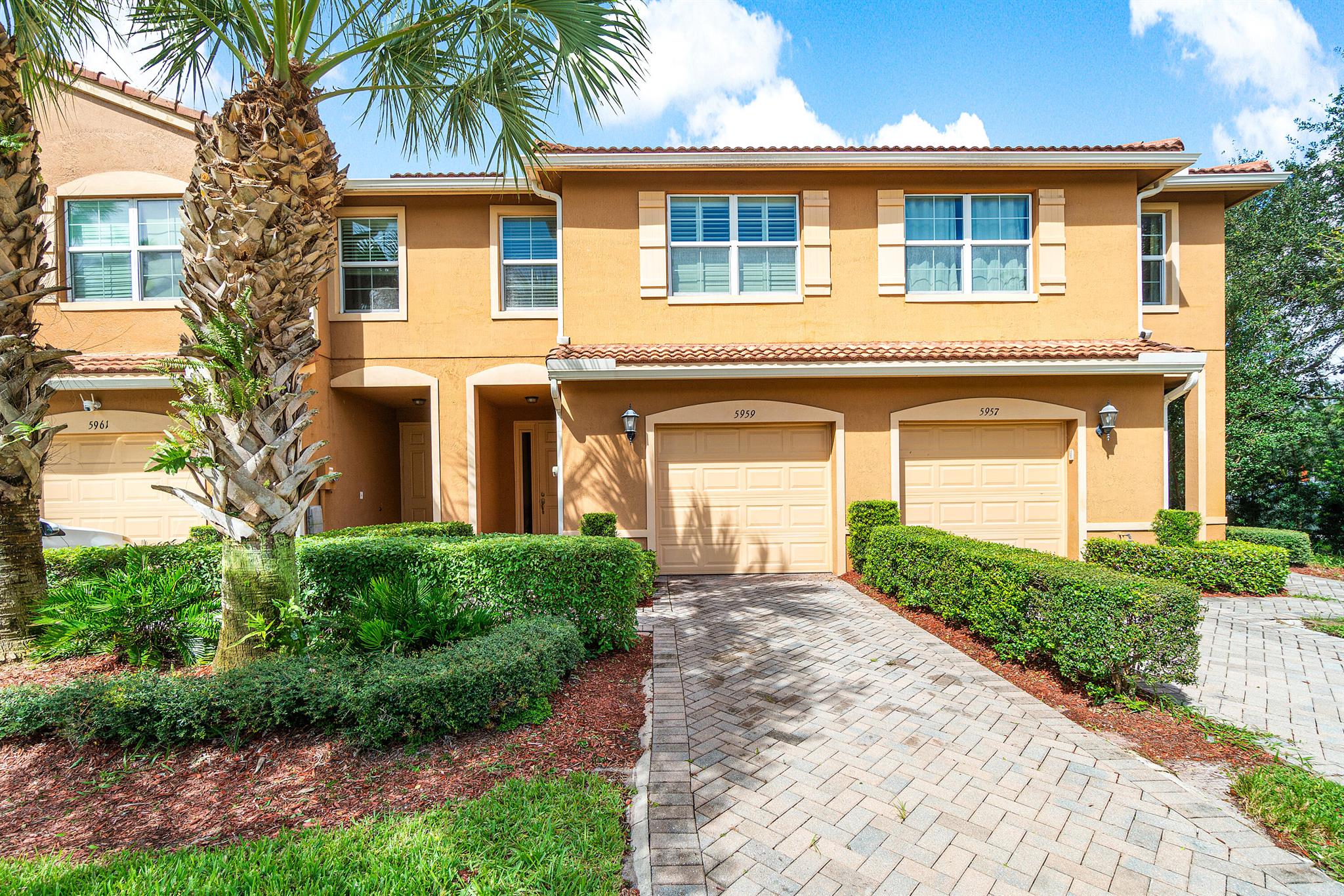 Welcome to Colony Reserve! This former model home blends comfort, upgrades, and stunning lake views. The kitchen features shaker cabinetry, granite countertops, and stainless-steel appliances. Enjoy recessed lighting, plantation shutters, and custom finishes, including electric blinds on the sliding glass door. The owner's suite offers tray ceiling detail, dual California Closets, a spa-style bath with double vanities, soaking tub, and walk-in shower. Additional features include a water filtration system, garage with epoxy flooring and built-in storage, and one of the community's largest 170 sq. ft. terraces, perfect for entertaining or relaxing by the lake. Hot tub excluded, sold separately. Resort-style amenities-clubhouse, pool/spa, fitness center, basketball ct, playground, and trails