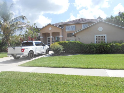 Photo of 2158 Portland Avenue, Wellington, FL 33414 (MLS # B26046510)