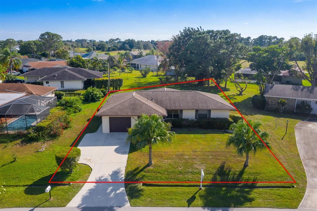 Photo of 1418 SE Santurce Road, Port Saint Lucie, FL 34952 (MLS # R10688100)