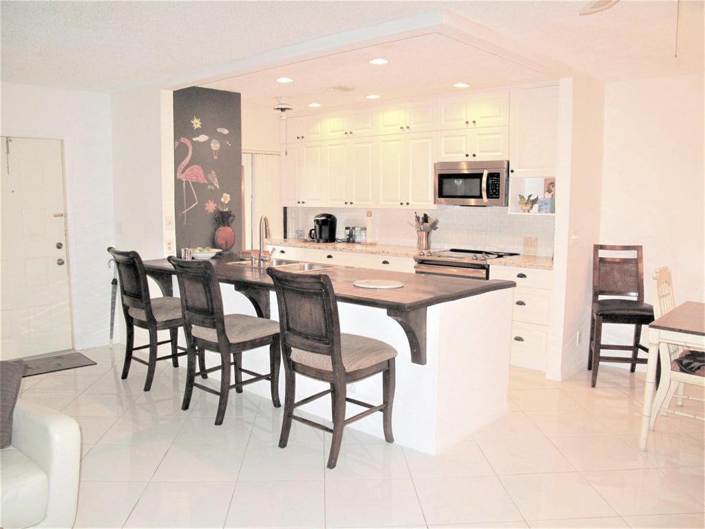 Photo of 5031 NESTING Way #D, Delray Beach, FL 33484 (MLS # B26080560)