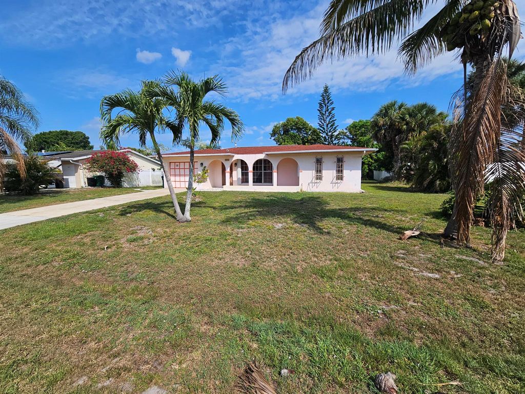 Photo of 389 SE Tranquilla Avenue, Port Saint Lucie, FL 34983 (MLS # R11094215)