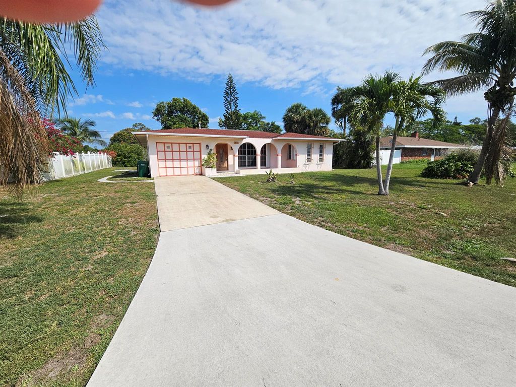 Photo of 389 SE Tranquilla Avenue, Port Saint Lucie, FL 34983 (MLS # R11094215)