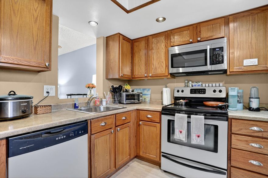 ALL IMPACT WINDOWS. FIRST FLOOR CORNER UNIT. OVER $21,000. SPENT ON WINDOWS DOORS AND IMPACT WALL OF GLASS. VACANT and Move In Ready. Buy in 2025 and file for Homestead Exemption for 2026.  ALL BEAUTIFUL FLOORING COST $8,000. LOCATED ON GOLF COURSE, NO MEMBERSHIP REQUIRED.  IMPACT WALL OF GLASS AT FLORIDA ROOM. IMPACT FRONT DOOR. IMPACT PEDISTRIAN DOOR AT SUN ROOM. YOUR SHIP HAS COME IN. THIS IS THE ONE YOU HAVE BEEN LOOKING FOR. FIRST FLOOR, CORNER, WOOD KITCHEN CABINETS, STAINLESS APPLIANCES. DON'T WAIT TOO LONG. CALL NOW AND SEE. WE HAVE THE KEY. Maint. FEE $667/Mo.= Water, Sewer, Cable, Building Insurance, Landscaping, Bldg Maint., 2 Pools, 4 Saunas, Ballroom, ShuffleBoards, BBQs, Billards, Library, Gym,  On Site Property Management Team. Etc
