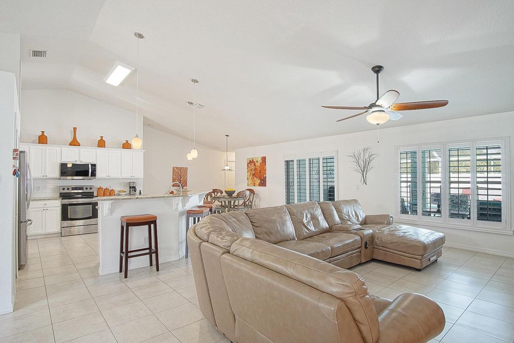 Photo of 5933 NW Baynard Drive, Port Saint Lucie, FL 34986 (MLS # R11077513)