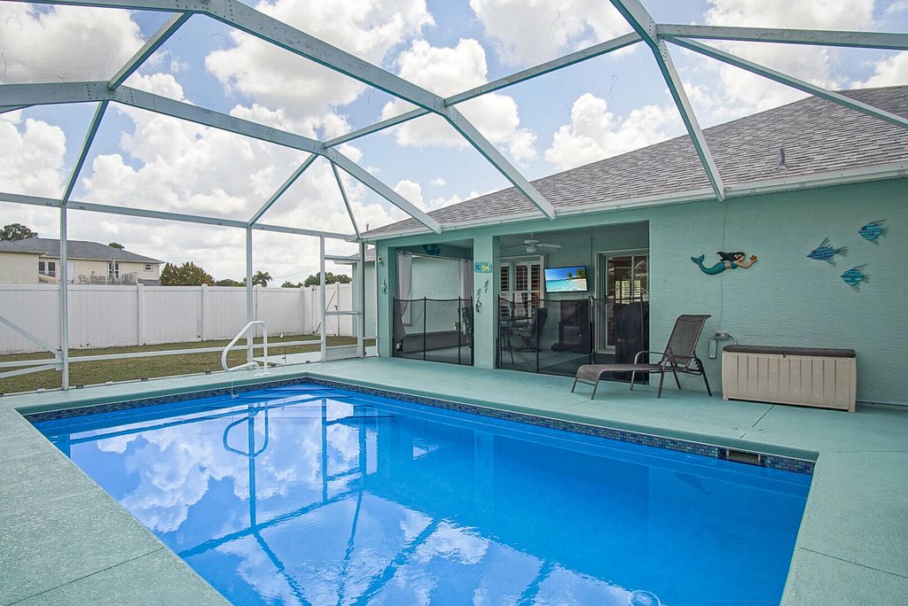 Photo of 5933 NW Baynard Drive, Port Saint Lucie, FL 34986 (MLS # R11077513)