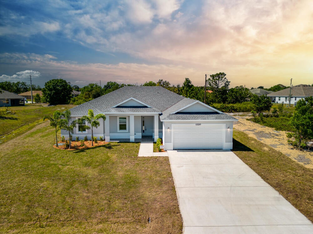 Photo of 5517 NW Downs Street, Port Saint Lucie, FL 34986 (MLS # R10858245)