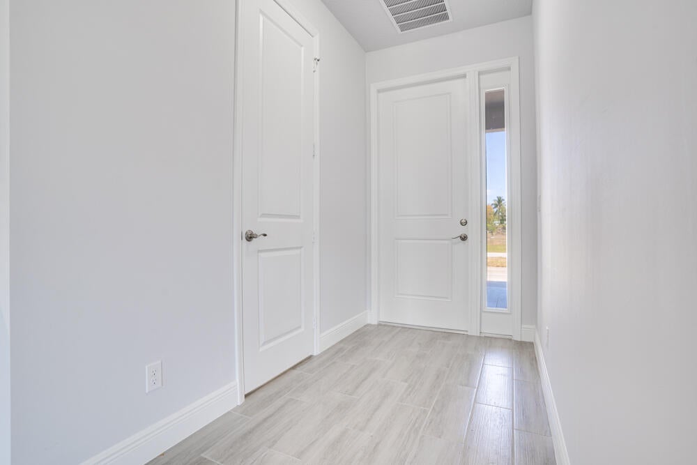 Photo of 5517 NW Downs Street, Port Saint Lucie, FL 34986 (MLS # R10858245)