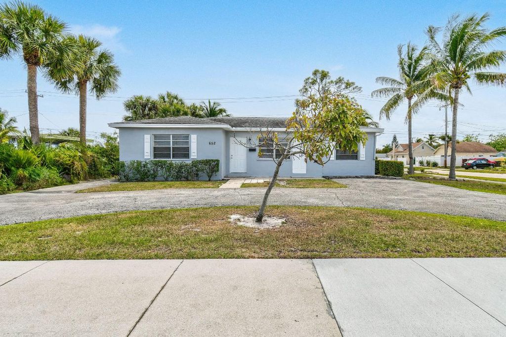 Photo of 652 Bayberry Drive, Lake Park, FL 33403 (MLS # R11073515)