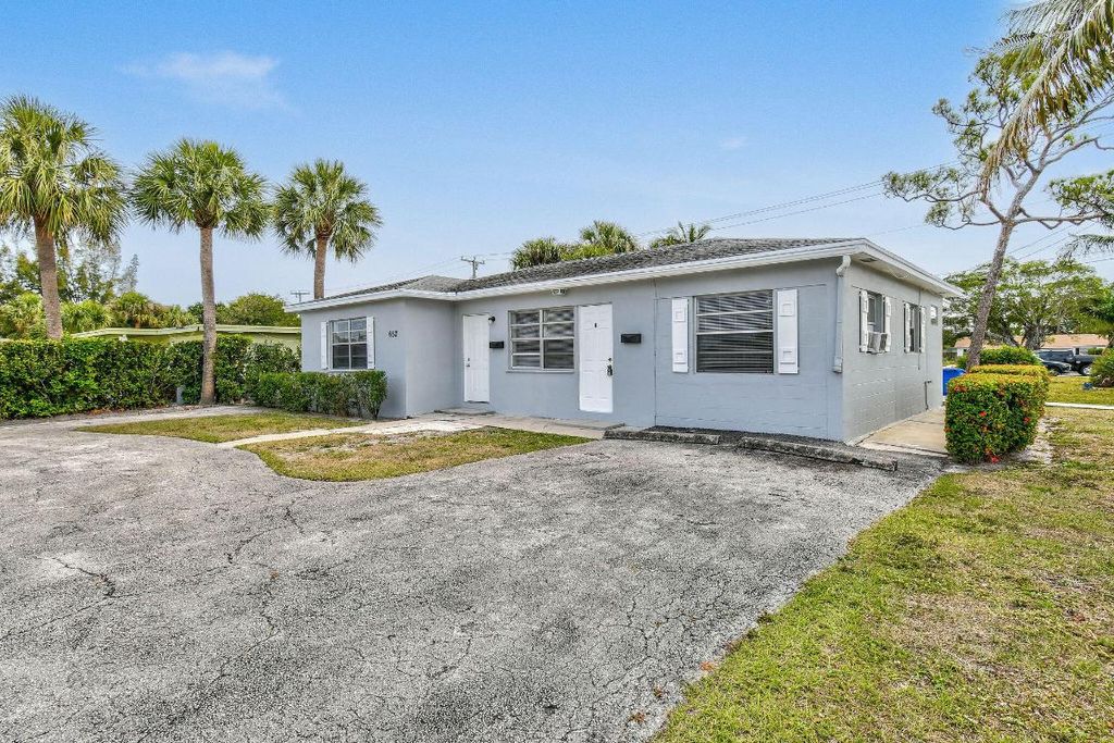 Photo of 652 Bayberry Drive, Lake Park, FL 33403 (MLS # R11073515)