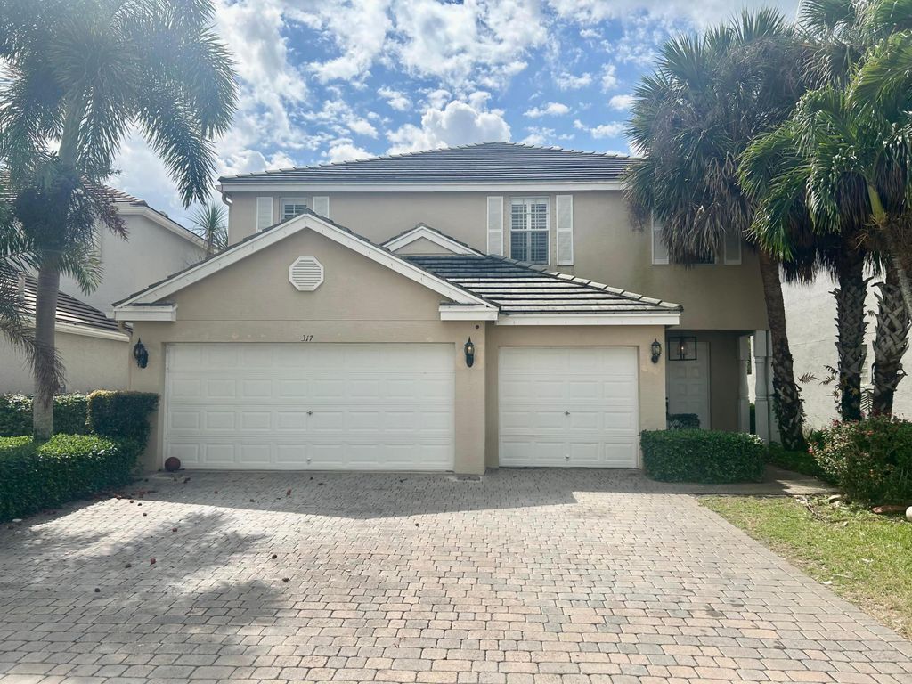 Photo of 317 Berenger Walk, Royal Palm Beach, FL 33414 (MLS # B26005924)