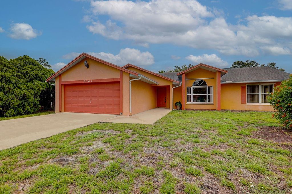 Photo of 2265 SE Carnation Road, Port Saint Lucie, FL 34952 (MLS # R10804965)