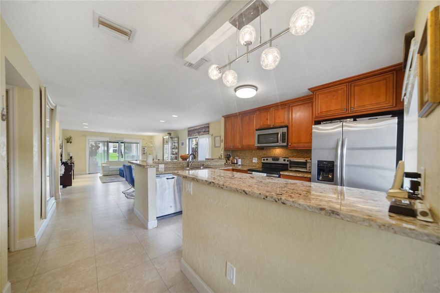 ALL AGES WELCOME! Discover the epitome of comfort in the heart of Boca. This corner 2 bed, 2 bath haven nestled in a gated community has not one but two enchanting patios! Embrace worry-free living with full hurricane protection. Located in a prime spot, enjoy the luxury of an updated open concept kitchen, large master with 3 closets, and included cable & internet. This gem is part of a golf community, and the best part? No membership required! Immerse yourself in a well-maintained oasis, from the community to the unit itself. Positioned on the first floor, revel in abundant natural light in this corner unit. Take a short stroll to the nearby pool & clubhouse or relax at home with the peace of mind of a newer water heater & AC unit, complete with a Nest device. Your dream home awaits!