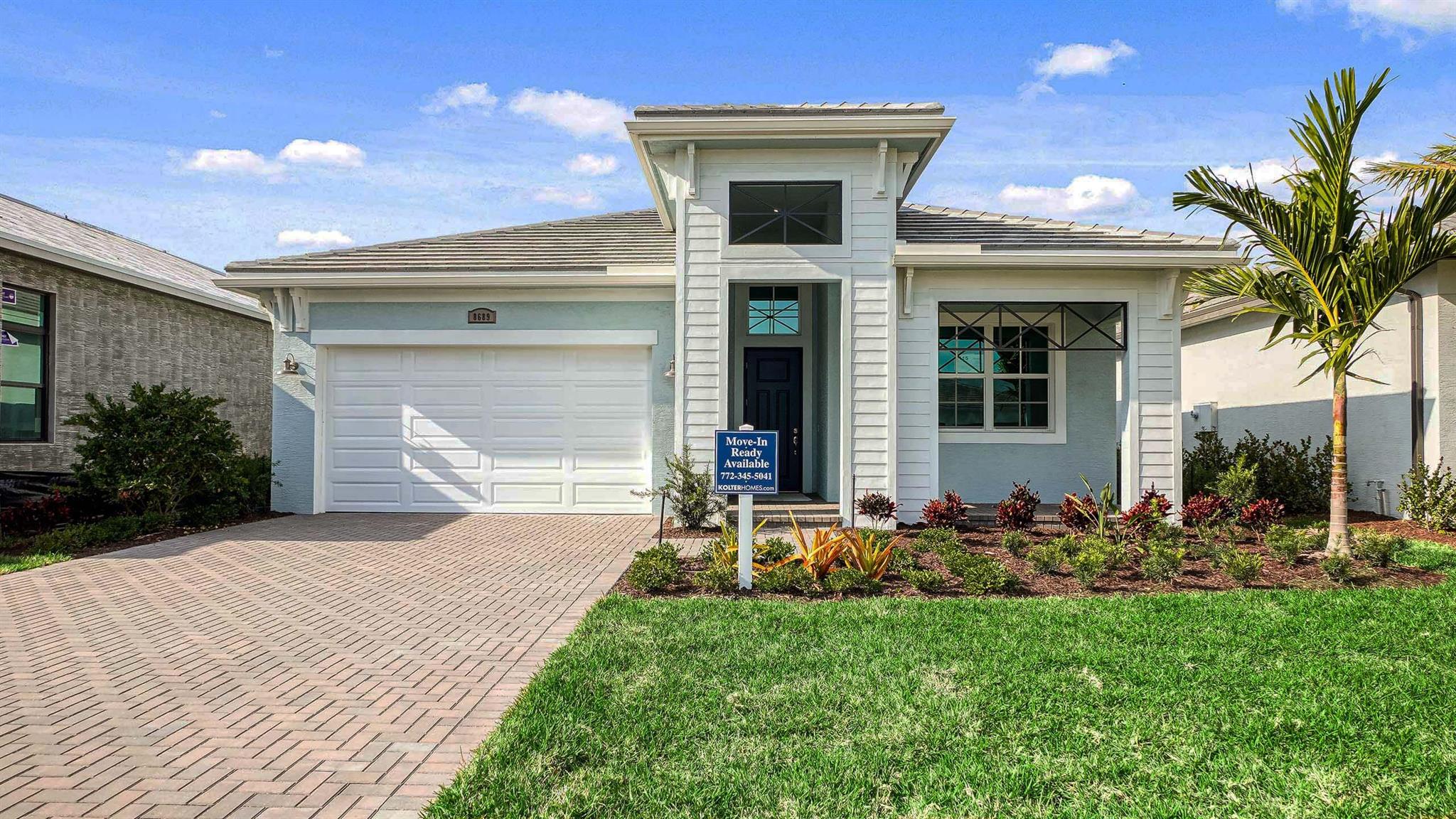 ***NEW CONSTRUCTION*** This coastal Madison floorplan offers 3 bedrooms, 3 baths, and a versatile Fitness/Study room. The gourmet kitchen has Cambria quartz counters, under-cabinet lighting, crown-molded cabinetry, and GE appliances. Elegant tray ceilings crown the space, while a dramatic 12'x10' sliding glass door floods the open-concept layout with light. The owner's suite features a frameless shower enclosure in brushed nickel, and premium laminate flooring runs throughout. Set in a gated community with nature trails nearby.