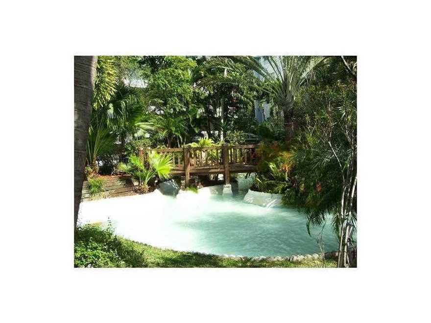 Discover modern comfort in this completely remodeled 1-bedroom, 1.5-bathroom condo featuring elegant wood flooring and a private large screen balcony. All stainless steel appliances including a water filtration system and a tankless water heater. Gorgeous cherry wood cabinetry along with ample granite countertops and unique details. The building offers exceptional amenities including a community pool, hot tub, clubroom, fitness center, and on-site laundry facilities. Conveniently located just walking distance to the beach, restaurants, nightlife, and shopping plazas. This condo is perfect for both relaxation and entertainment. Community Laundry and extra storage just steps away from your unit. Tenant occupied until Jan. 17 2026. Please allow 24hrs advance notice.