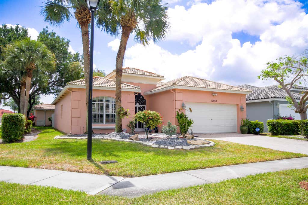 Photo of 12863 Coral Lakes Dr, Boynton Beach, FL 33437 (MLS # R11088411)