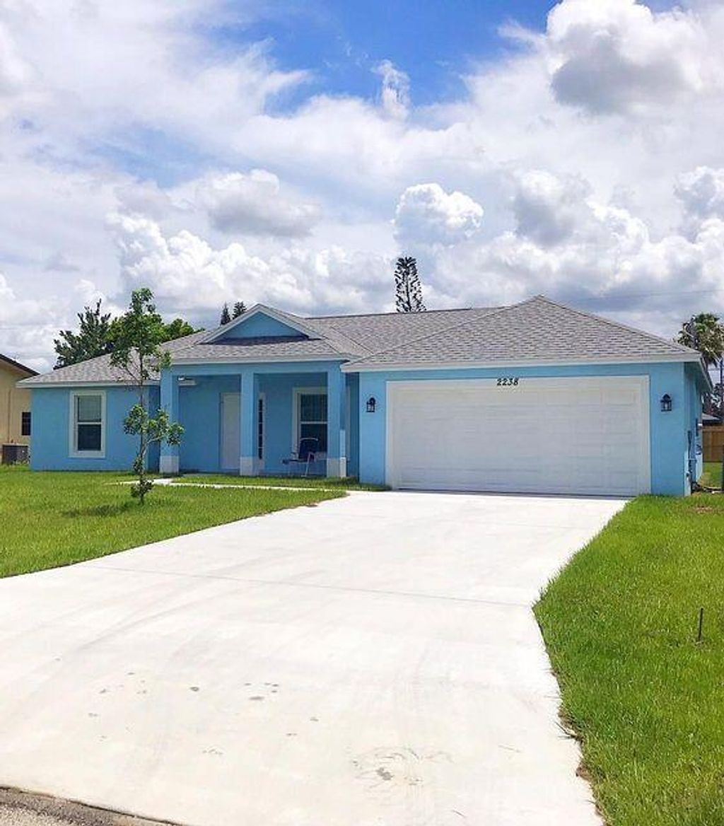 Photo of 2238 SE Gaslight Street, Port Saint Lucie, FL 34952 (MLS # R10792616)