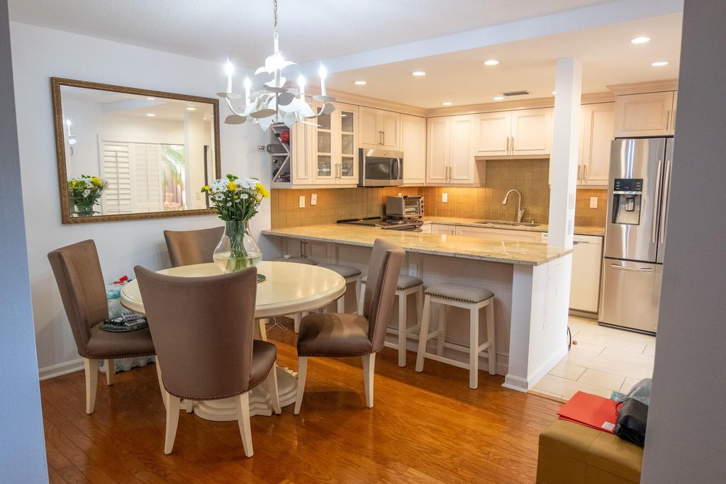 Photo of 1 Atrium Circle #A, Atlantis, FL 33462 (MLS # R10970050)