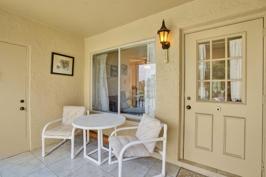 Photo of 221 Pine Hov Circle #B-2, Greenacres, FL 33463 (MLS # R11148145)