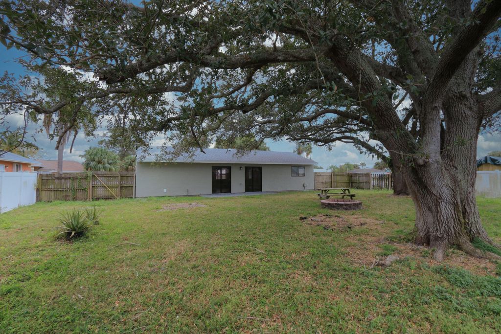 Photo of 2009 SE Mary Terrace, Port Saint Lucie, FL 34952 (MLS # B26001765)