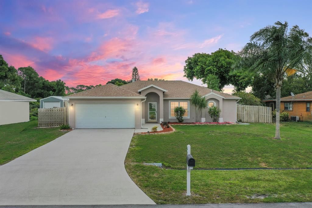 Photo of 629 NE Lagoon Lane, Port Saint Lucie, FL 34983 (MLS # R10710880)