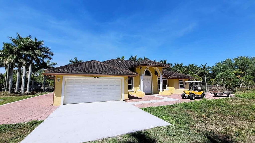 Photo of 4095 Windmill Road, Loxahatchee, FL 33470 (MLS # B26042601)
