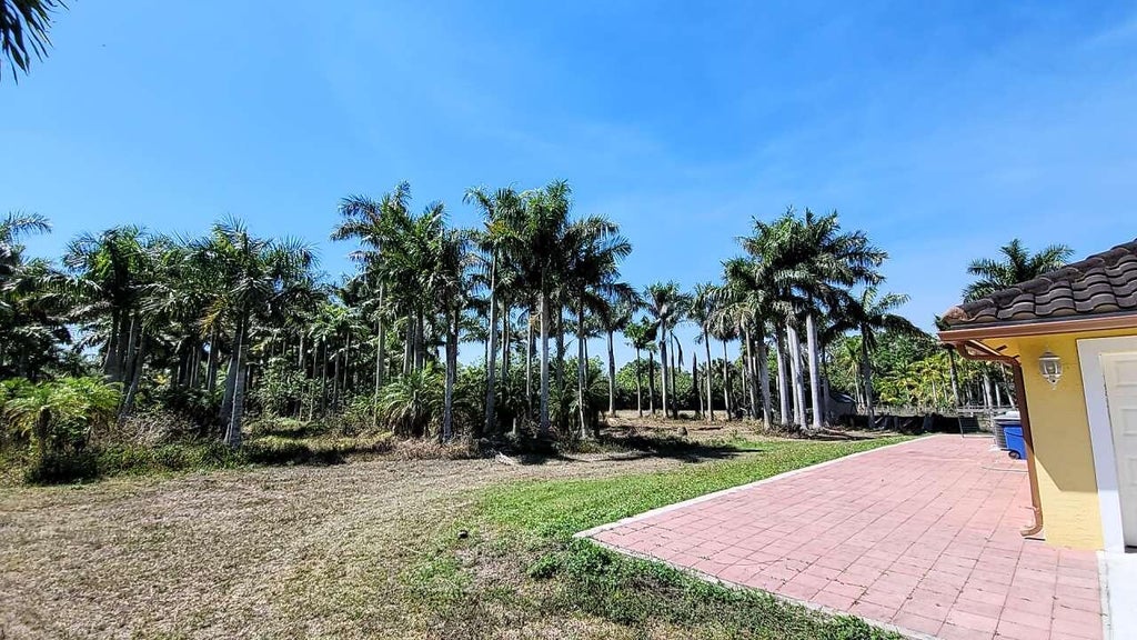 Photo of 4095 Windmill Road, Loxahatchee, FL 33470 (MLS # B26042601)