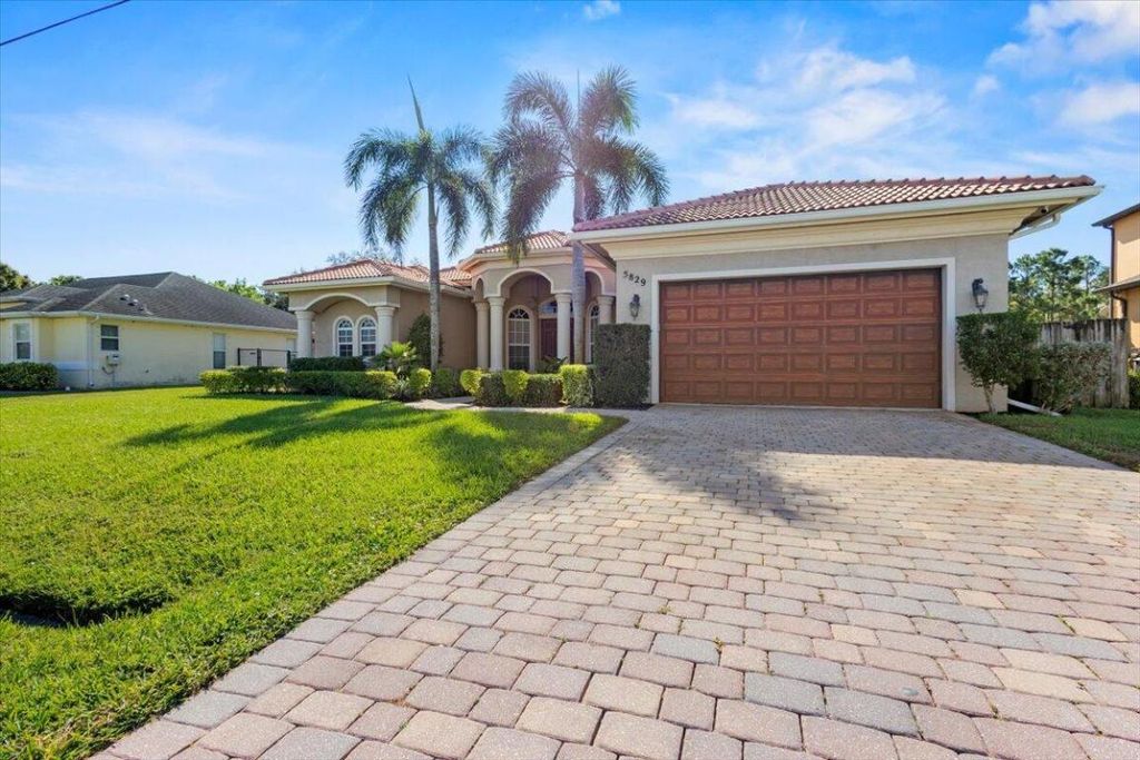 Photo of 5829 NW Zenith Drive, Port Saint Lucie, FL 34986 (MLS # R11142336)