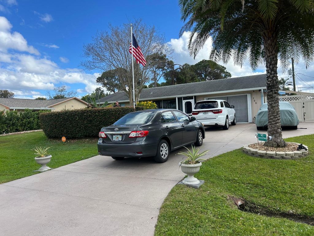 Photo of 266 SE Walsh Terrace, Port Saint Lucie, FL 34953 (MLS # R11066001)