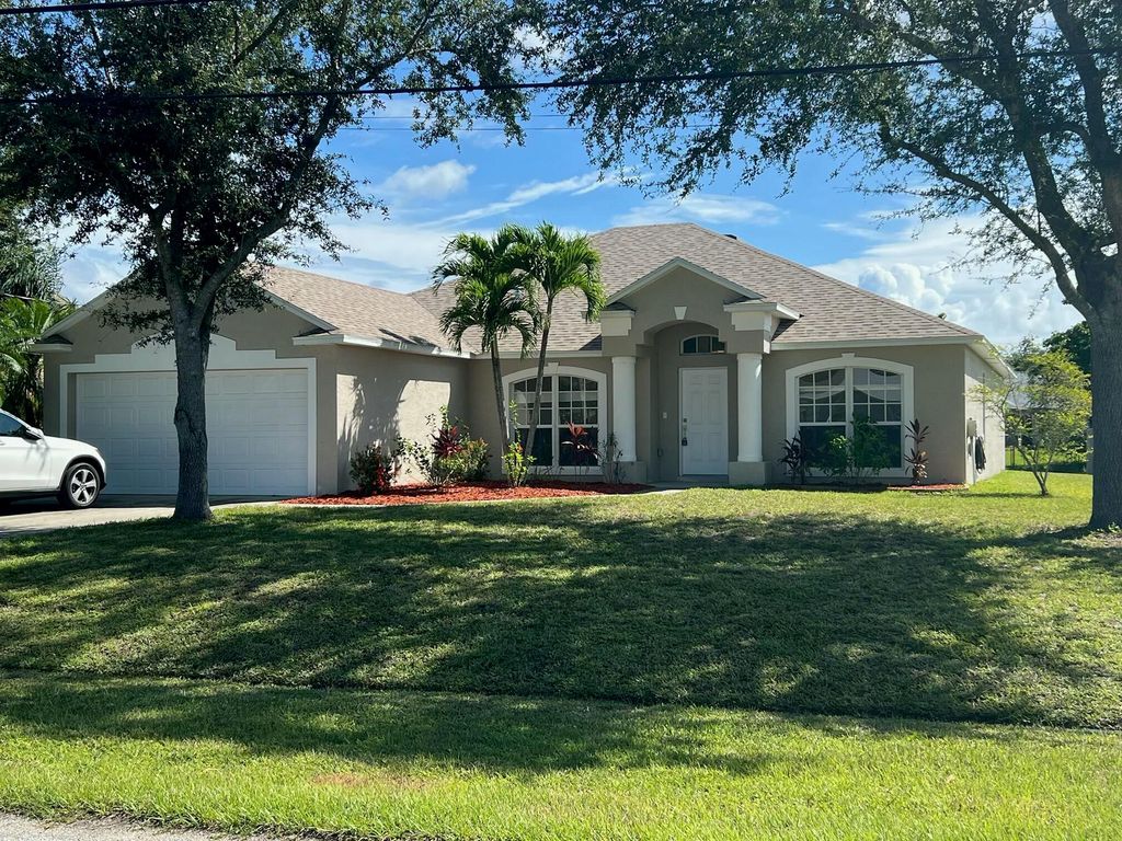 Photo of 518 SE Nome Drive, Port Saint Lucie, FL 34984 (MLS # R11084953)