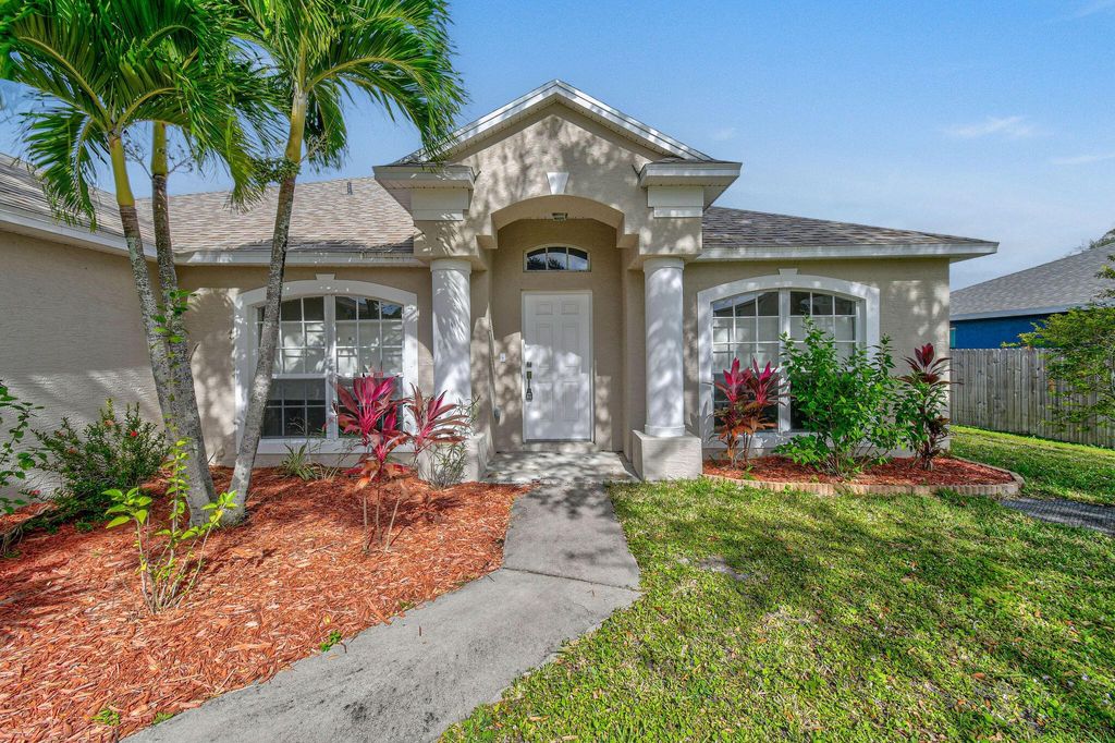 Photo of 518 SE Nome Drive, Port Saint Lucie, FL 34984 (MLS # R11084953)