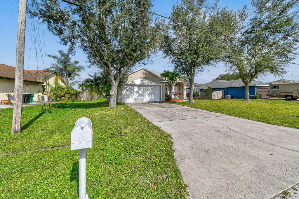 Photo of 518 SE Nome Drive, Port Saint Lucie, FL 34984 (MLS # R11084953)