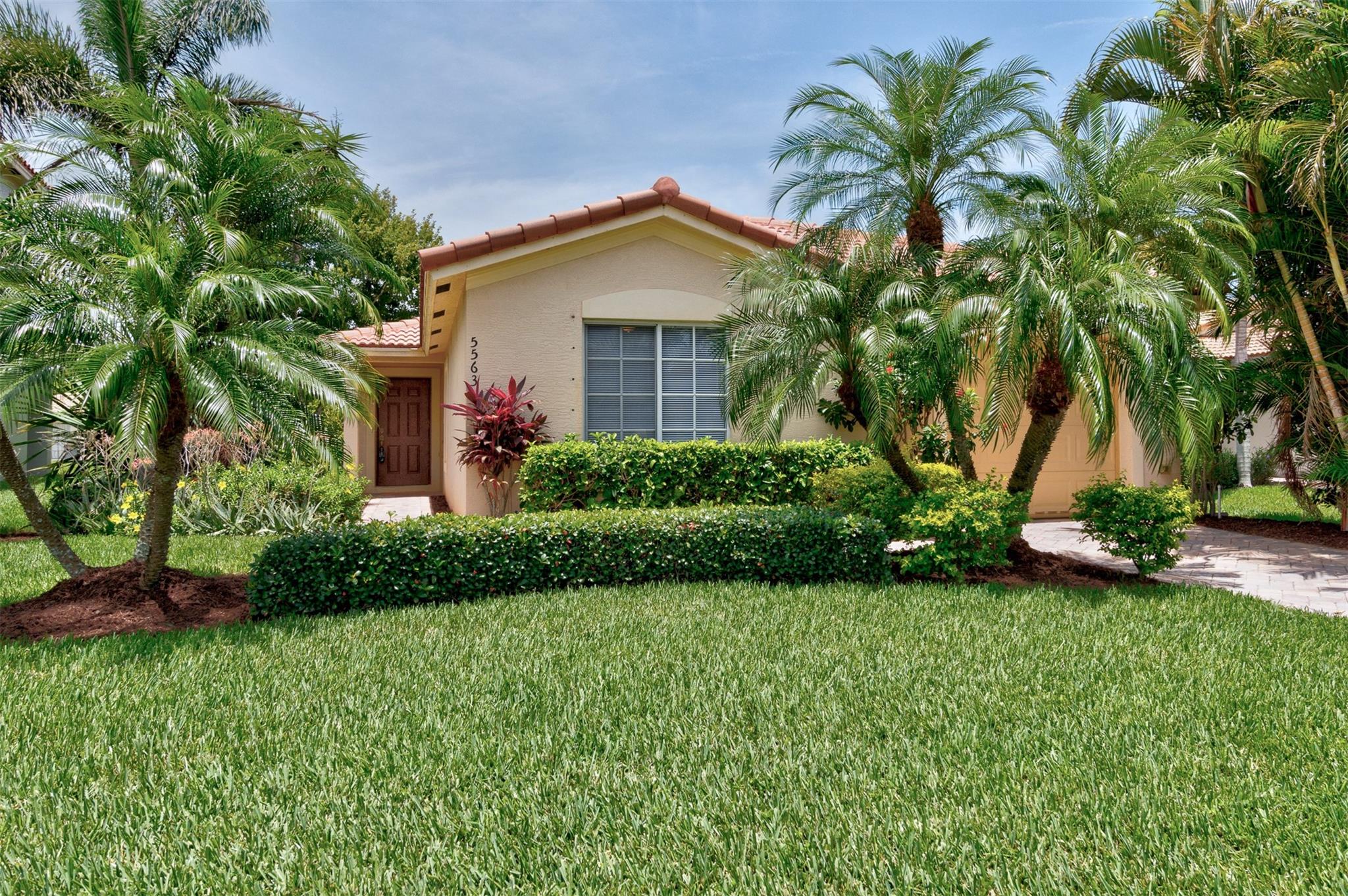 FRESHLY PAINTED, NEW VINYL FLOORING, NEW LIGHTING THROUGHOUT, new window coverings, new dishwasher, newer w/d...ready for immediate occupancy. VeroLago is a resort style, friendly community with POOL, fitness center, playground, tennis & pickleball. Yard care, irrigation, security, paver sidewalks and community amenities included in monthly HOA fees. Just 7 miles to beach and 5 miles to shopping & restaurants plus next door to Bent Pine golf club. This 3bed, 2 bath 1 car garage offers split floor plan, vaulted ceilings, laundry room, paver driveway, wide open backyard and eat at kitchen bar.