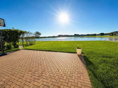 Photo of 850 Gairloch Lane, Fort Pierce, FL 34947 (MLS # B26053803)