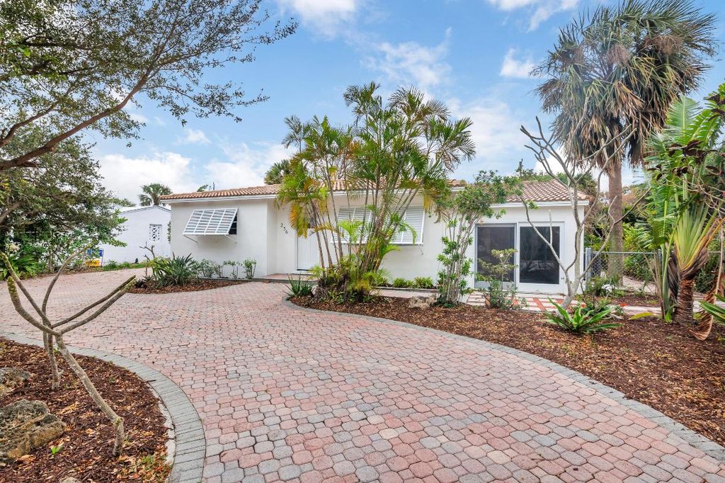 Photo of 236 Ashworth Street, West Palm Beach, FL 33405 (MLS # R11140867)