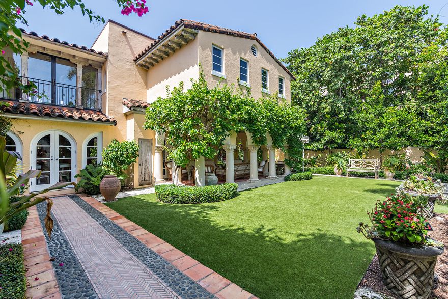 Originally built in 1925, this 8-bed, 8.2-bath estate exudes true Palm Beach style. Timeless architectural details feature Cypress coffered ceilings, arched windows, wrought iron gates, and railings. Low maintenance turf in the courtyard along with an outdoor shower, fountains and spa. The guest house has been updated with impact windows and doors, 2-beds, 2-bath, living area and bar. Expansive doors open to the pool area. Perfect In-Town location. Close proximity to Worth Avenue, restaurants, shops and the beach.