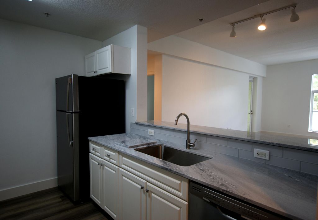 Photo of 1203 Town Center Drive #209, Jupiter, FL 33458 (MLS # R10871045)