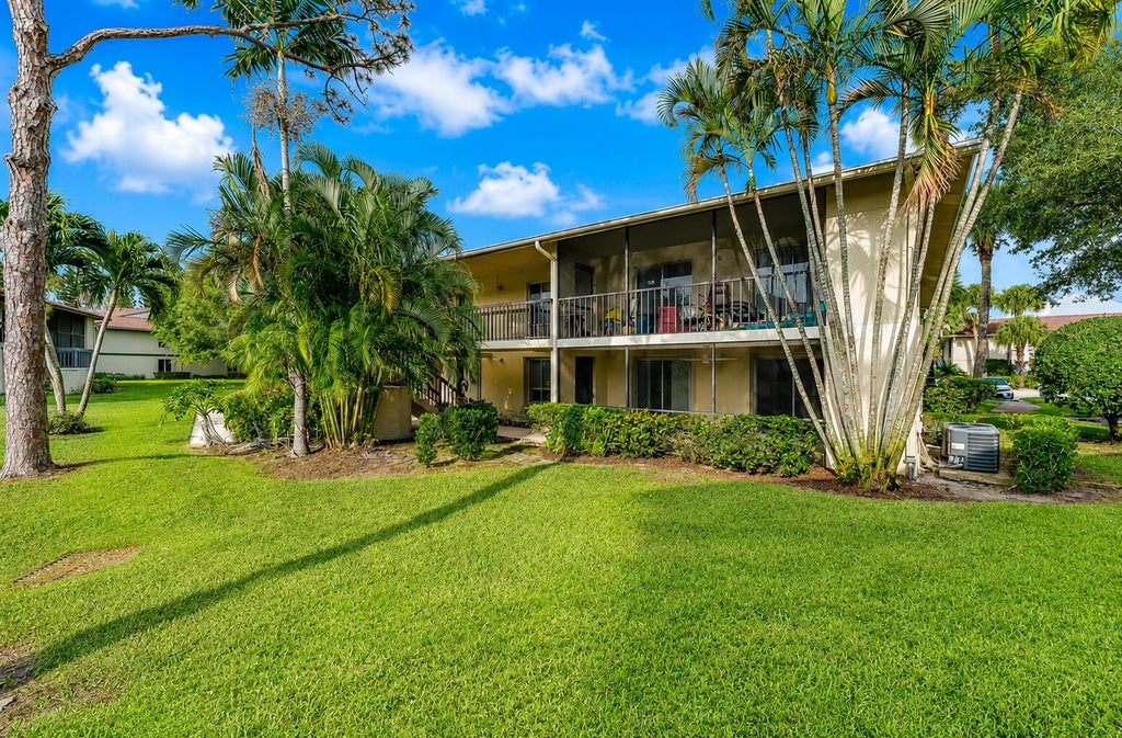 Photo of 6519 Chasewood Drive #D, Jupiter, FL 33458 (MLS # B26068458)