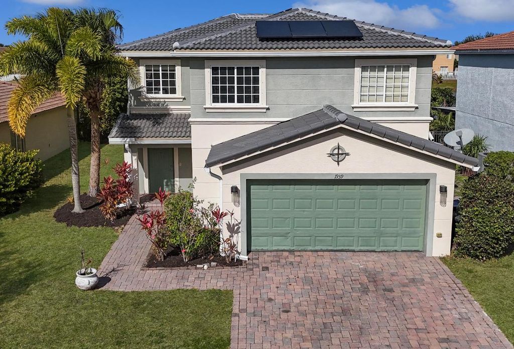 Photo of 1939 SW Jamesport Drive, Port Saint Lucie, FL 34953 (MLS # R11157673)