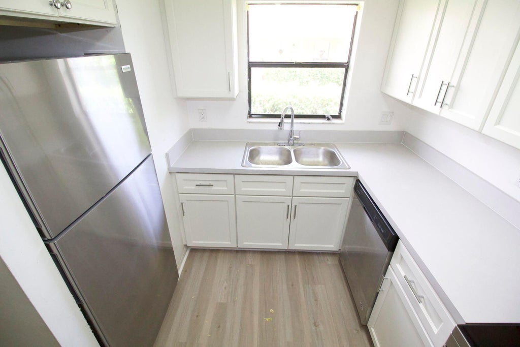 Photo of 3820 Harwood Street, West Palm Beach, FL 33403 (MLS # B26041563)