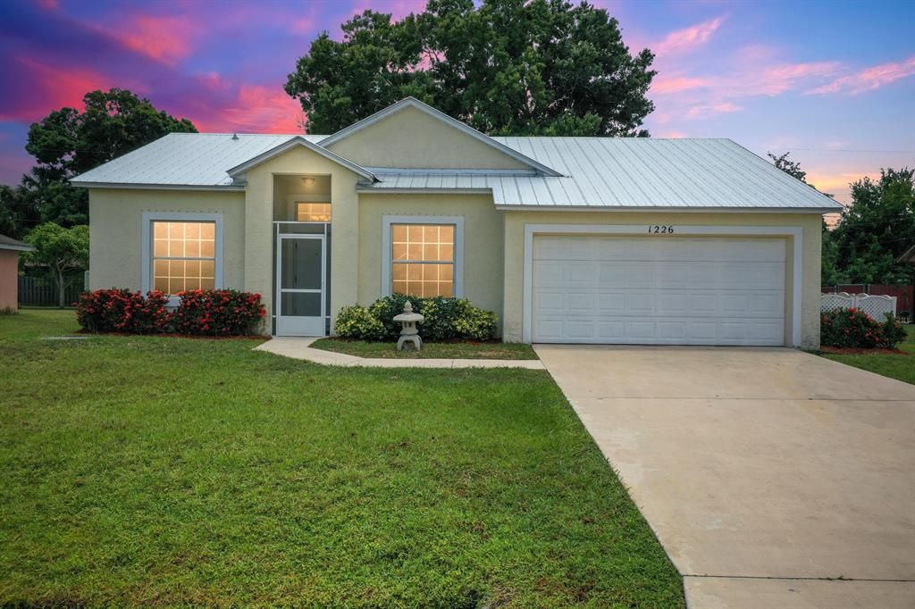 Photo of 1226 SW Century Avenue Ave, Port St Lucie, FL 34953 (MLS # R10815309)