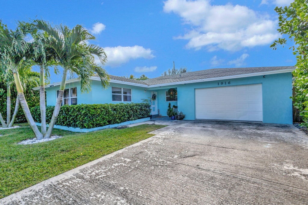 Photo of 1916 Pleasant Drive, North Palm Beach, FL 33408 (MLS # R11044095)