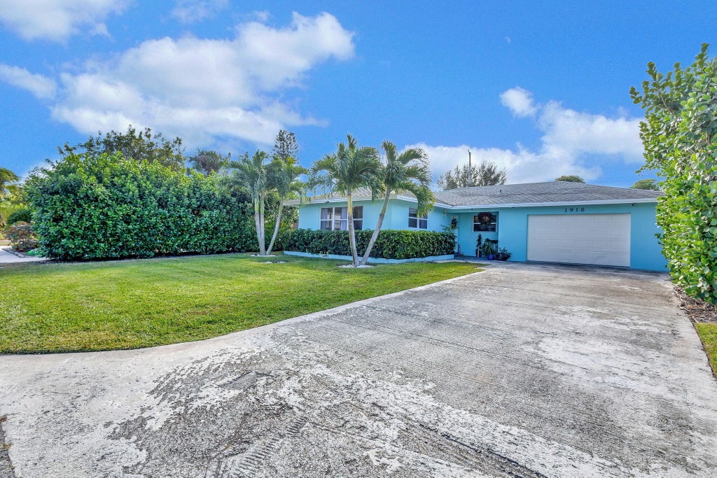 Photo of 1916 Pleasant Drive, North Palm Beach, FL 33408 (MLS # R11044095)