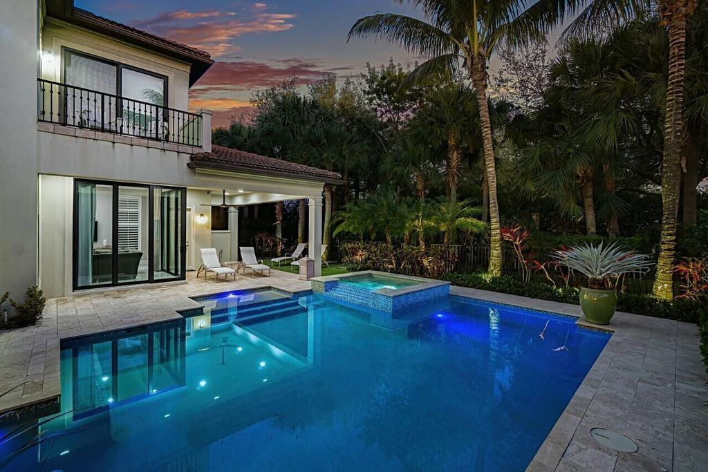 Photo of 130 Gardenia Isles Drive, Palm Beach Gardens, FL 33418 (MLS # B26028893)