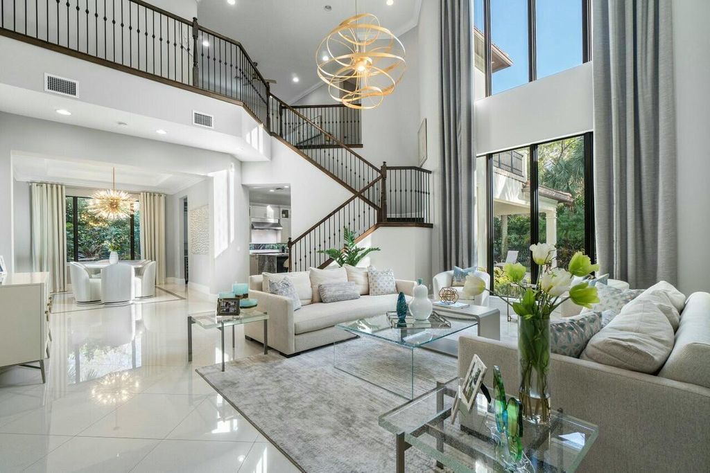 Photo of 130 Gardenia Isles Drive, Palm Beach Gardens, FL 33418 (MLS # B26028893)