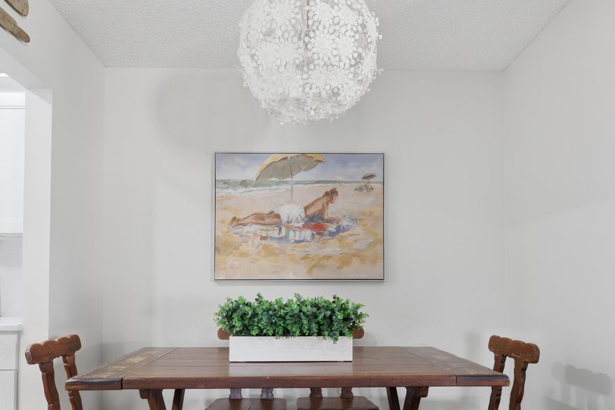 Beautifully renovated 2BR/1BA second-floor condo nestled in the highly sought-after 55+ community of Pine Ridge IV. This bright, open-concept unit features modern finishes, large windows that flood the space with natural light, and stunning luxury vinyl plank flooring throughout — 100% waterproof and perfect for Florida living. Enjoy the convenience of in-unit laundry and a private balcony with additional storage. Pine Ridge IV offers a well-maintained, resort-style community complete with a sparkling pool, clubhouse, bocce ball, shuffleboard courts, walking paths, and lush common green areas — everything you need to embrace the coveted South Florida lifestyle.  Conveniently located near premier shopping, dining, and major roadways. Furniture not included. Don't miss this move-in ready gem No rentals permitted for the first 2 years of ownership. Association approval required.