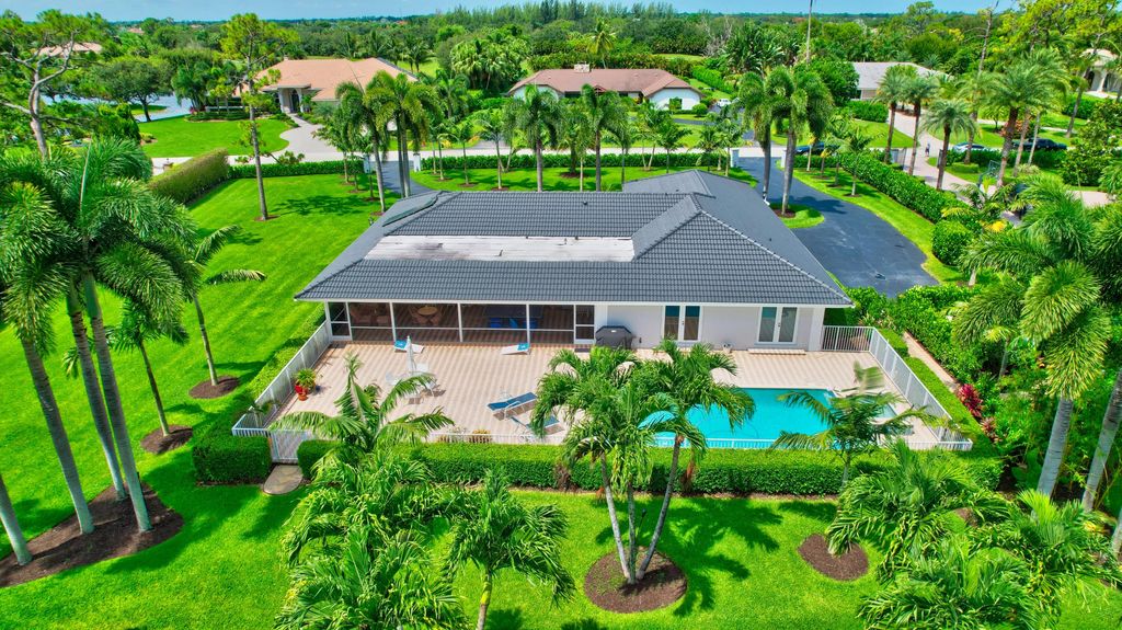 Photo of 9320 Dundee Drive, Lake Worth, FL 33467 (MLS # R10900579)